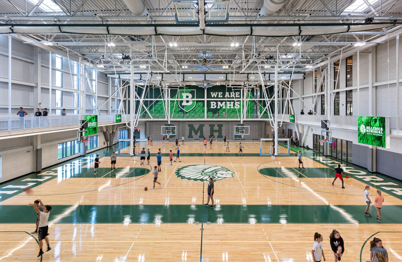 View of gymnasium with upper level running track