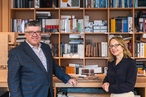 cecily and d'arcy in a studio library